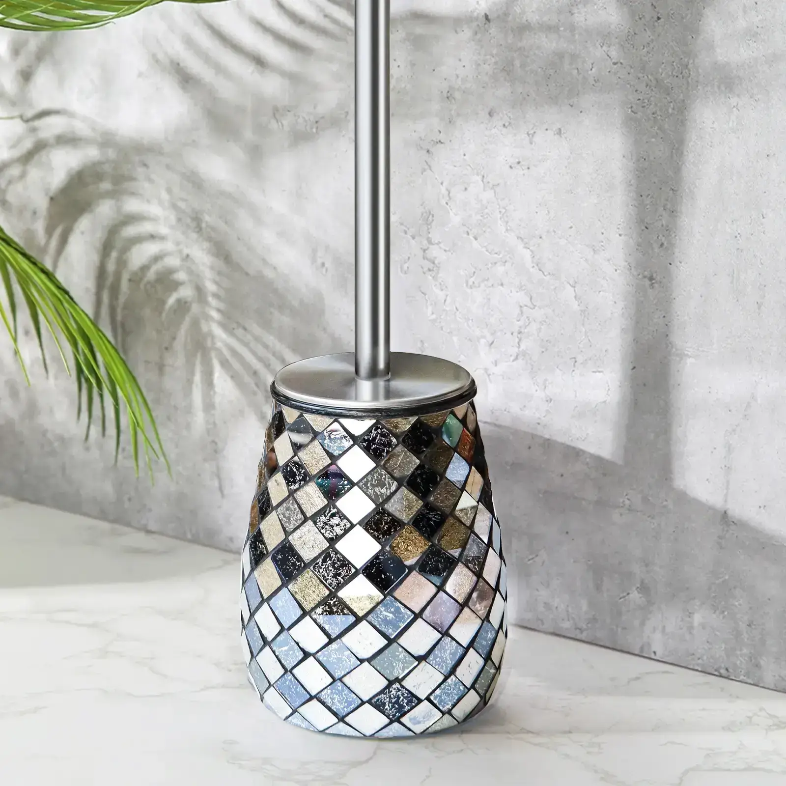 Rust-resistant black and gold stainless steel toilet brush with decorative mosaic glass holder, designed for efficient cleaning and luxurious bathroom decor