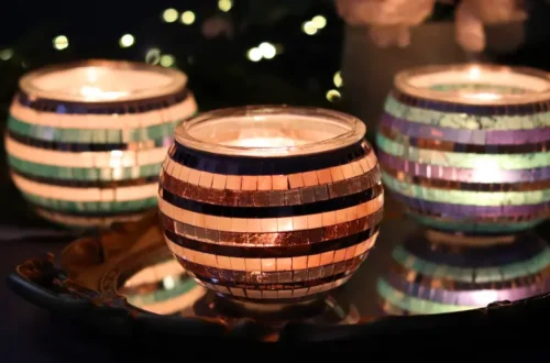 Elegant glass candle holder, a perfect housewarming gift, adding warmth and charm to any room.
